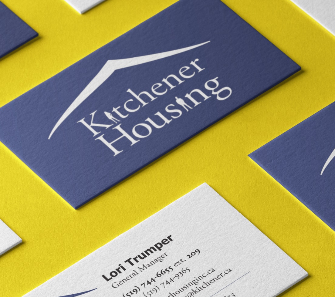 Business card mockup for Kitchener Housing. Designed and shot by Token Creative Services kitchener
